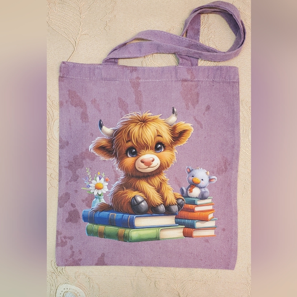 🪻3/$25 Tie dye Purple baby highland cow sitting stack of books custom tote bag
